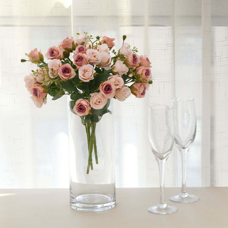 Blush artificial rose bouquet in a tall vase