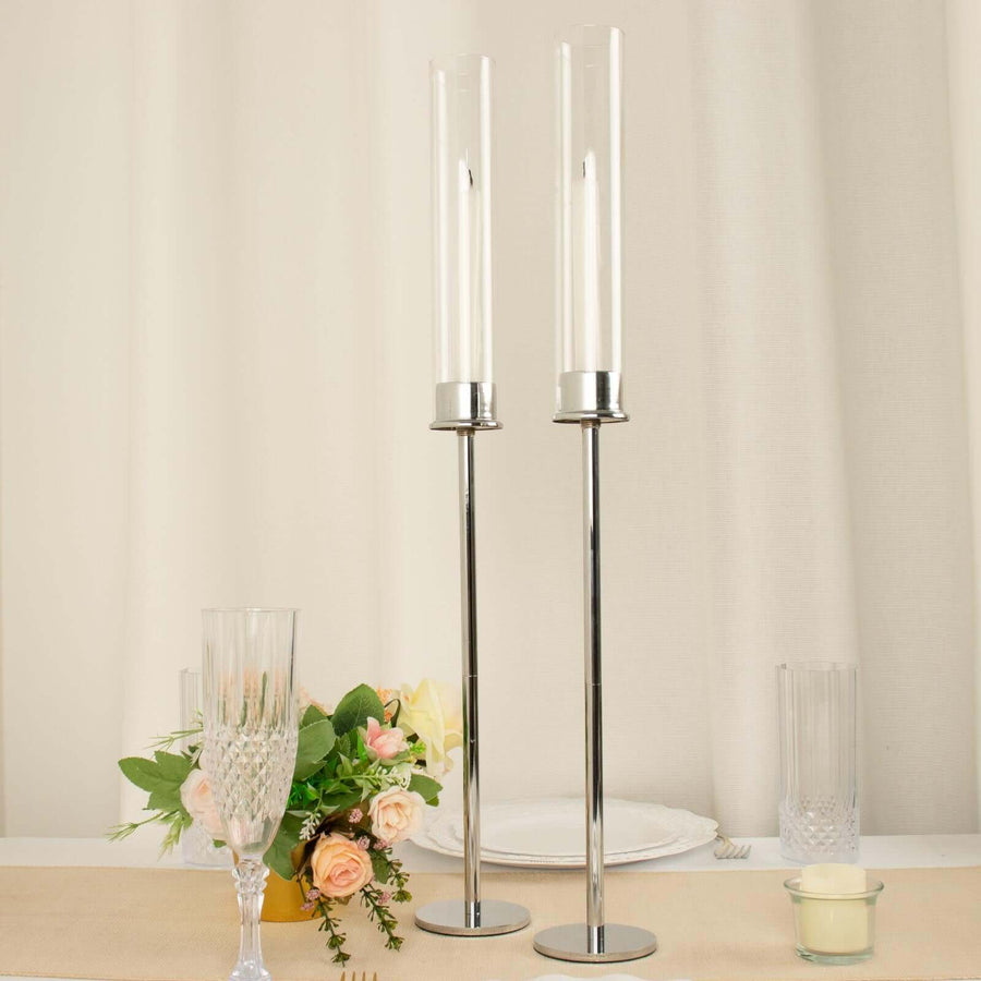 2 Pack | 24inch Silver Metal Clear Glass Hurricane Candle Stands With Glass Chimney Candle Shades
