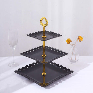 3-Tier Plastic Square Cupcake Stand Tower Black - Charming Disposable Dessert Display Serving Tray Platter with Heart Wavy Edge & Gold Top Handle for Tea Parties Weddings & Special Occasions 13"