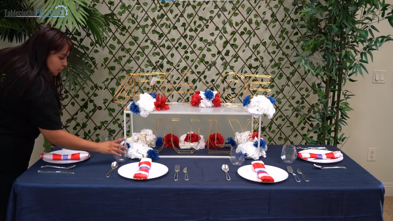 Woman setting each place with disposable dinnerware