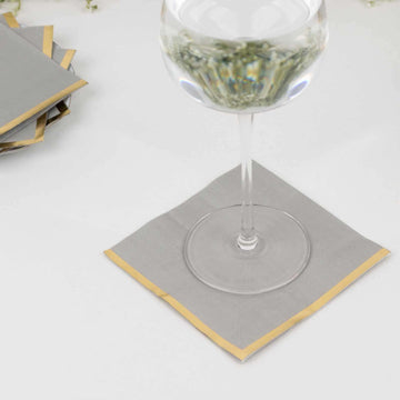 50-Pack Paper Beverage Napkins Gray with Gold Foil Edge - 2 Ply Disposable Soft 18GSM Cocktail Napkins 5"x5"