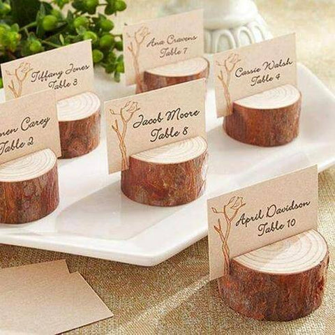 Rustic table number holders on wood slices
