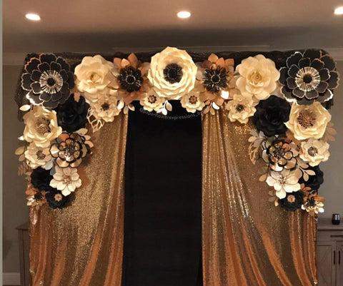 Gold and ivory anniversary backdrop with florals