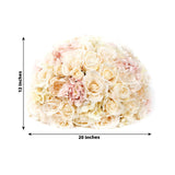 Artificial floral arrangement in soft white and pink hues, 20 inches wide.