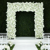 White floral archway backdrop for weddings and events.