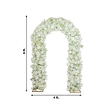 White floral wedding arch with roses and hydrangeas on a plain background