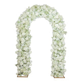 White floral wedding arch with roses and hydrangeas on a plain background