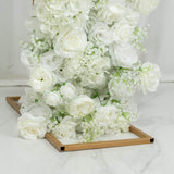 White rose and hydrangea floral arrangement on gold stand