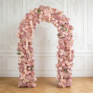 Pink floral arch wedding backdrop in elegant white paneled room