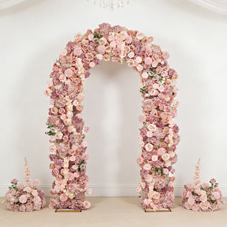 Pink floral arch wedding backdrop with matching flower arrangements