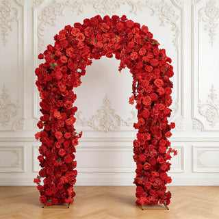 Red rose floral archway against ornate white wall interior decor
