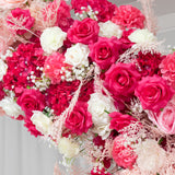 Vibrant arrangement of pink and white artificial flowers in full bloom. #whtbkgd
