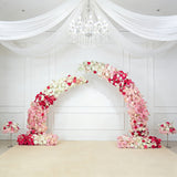 Floral arch decoration in pink and white for events and weddings.