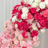 Colorful floral arrangement with pink and red roses, peonies, and decorative greenery. #whtbkgd