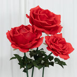 Artificial red roses bouquet with green leaves.