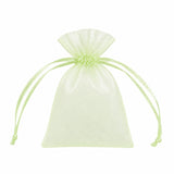 Pale green organza drawstring gift pouch on white background#whtbkgd