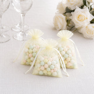 Pastel candy favor bags with tulle ribbon for wedding or party gifts