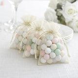 Pastel candy-filled organza bags for party favors
