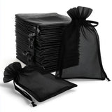 Black organza gift bags with drawstrings, set of multiple sizes.