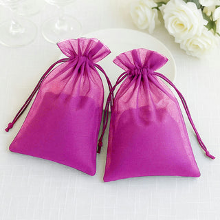 Purple organza gift bags with drawstring closure, set of two.