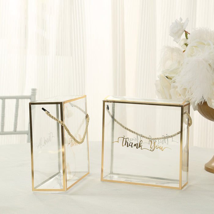 Transparent gift boxes with gold accents and "Thank You" inscriptions.