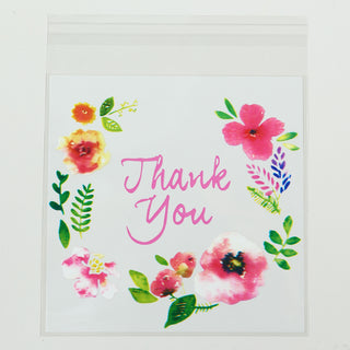 <span style="background-color:transparent;color:#111111;">Durable and Practical Clear White Floral Print Candy Bags</span>
