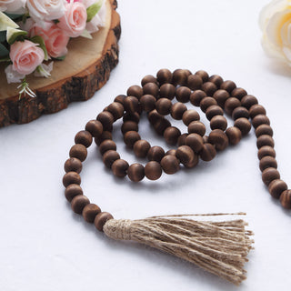 Add Warmth and Style with the 55" Brown Rustic Boho Chic Wood Bead Garland