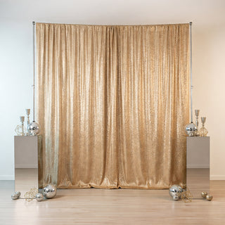 Gold sequin backdrop with decorative elements for events and photography.