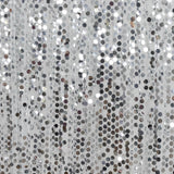 Abstract silver sequin curtain with metallic reflective circles