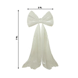 White satin bow with flowing tails, measuring 2 ft by 7 ft.