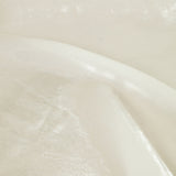 Close-up of shimmering sheer fabric texture.