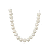 White oversized bead garland necklace on a plain background