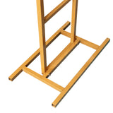 Yellow metal display stand with a sturdy base for stability.