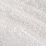 White decorative tulle with shimmering accents in a studio-style shot #whtbkgd