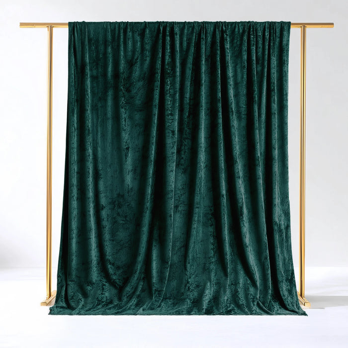 Emerald green velvet backdrop on a gold frame
