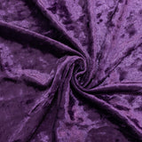 Purple textured fabric swirled in a circular pattern. #whtbkgd