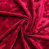 Deep red velvet fabric with a rich texture and sheen. #whtbkgd