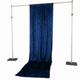 Blue velvet backdrop curtain on adjustable photography stand