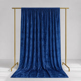 Blue velvet curtain on gold stand backdrop, luxury display backdrop