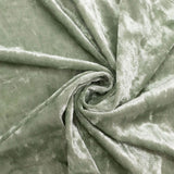 Soft sage green velvet fabric texture with elegant swirl folds#whtbkgd