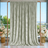 Elegant sage green velvet curtain on rose gold frame with floral decor and window view