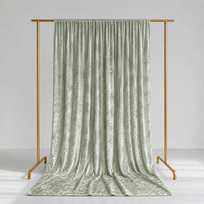 Sage green velvet curtains on gold clothing rack, elegant studio backdrop