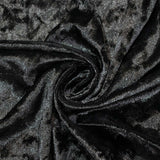 Shiny black velvet fabric texture with elegant spiral folds#whtbkgd