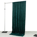 Emerald green velvet backdrop curtain on adjustable pipe stand