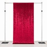 Red sequin backdrop curtain on adjustable silver stand frame