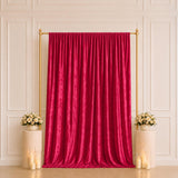Elegant red velvet curtain backdrop with gold frame, flowers and candles