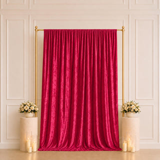 Elegant red velvet curtain backdrop with gold frame, flowers and candles