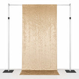 Gold sequin backdrop on adjustable photo booth stand