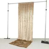 Gold sequin photo backdrop curtain on adjustable stand