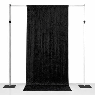 Black velvet backdrop curtain on adjustable photo stand frame